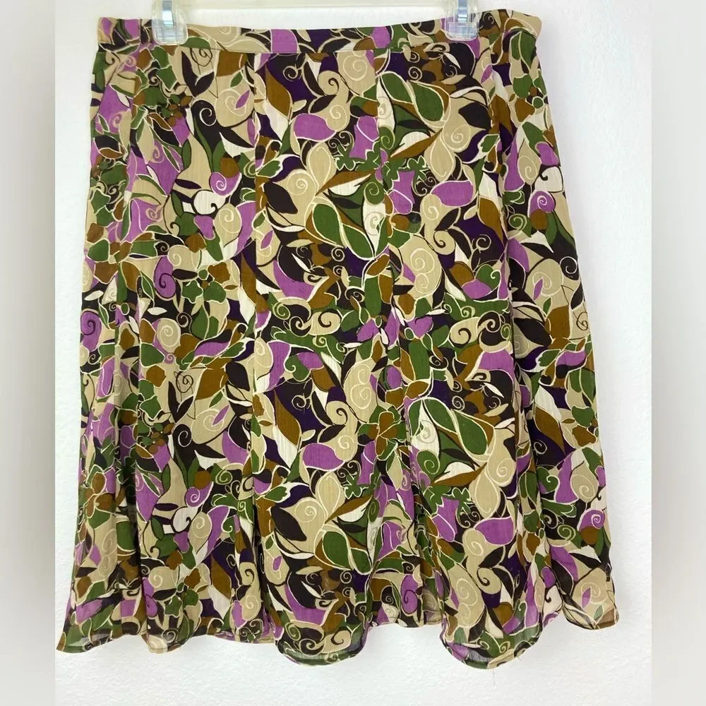 Pretty Floral chiffon skirt in mix of muted, neutrals and brights. Lined.